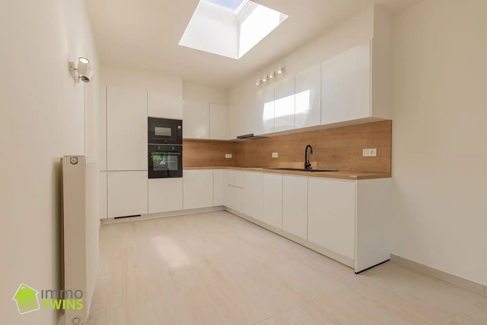 Ruim totaal gerenoveerd appartement van 119 m² met terras, staanplaats en garage te Appels bij Dendermonde foto 7