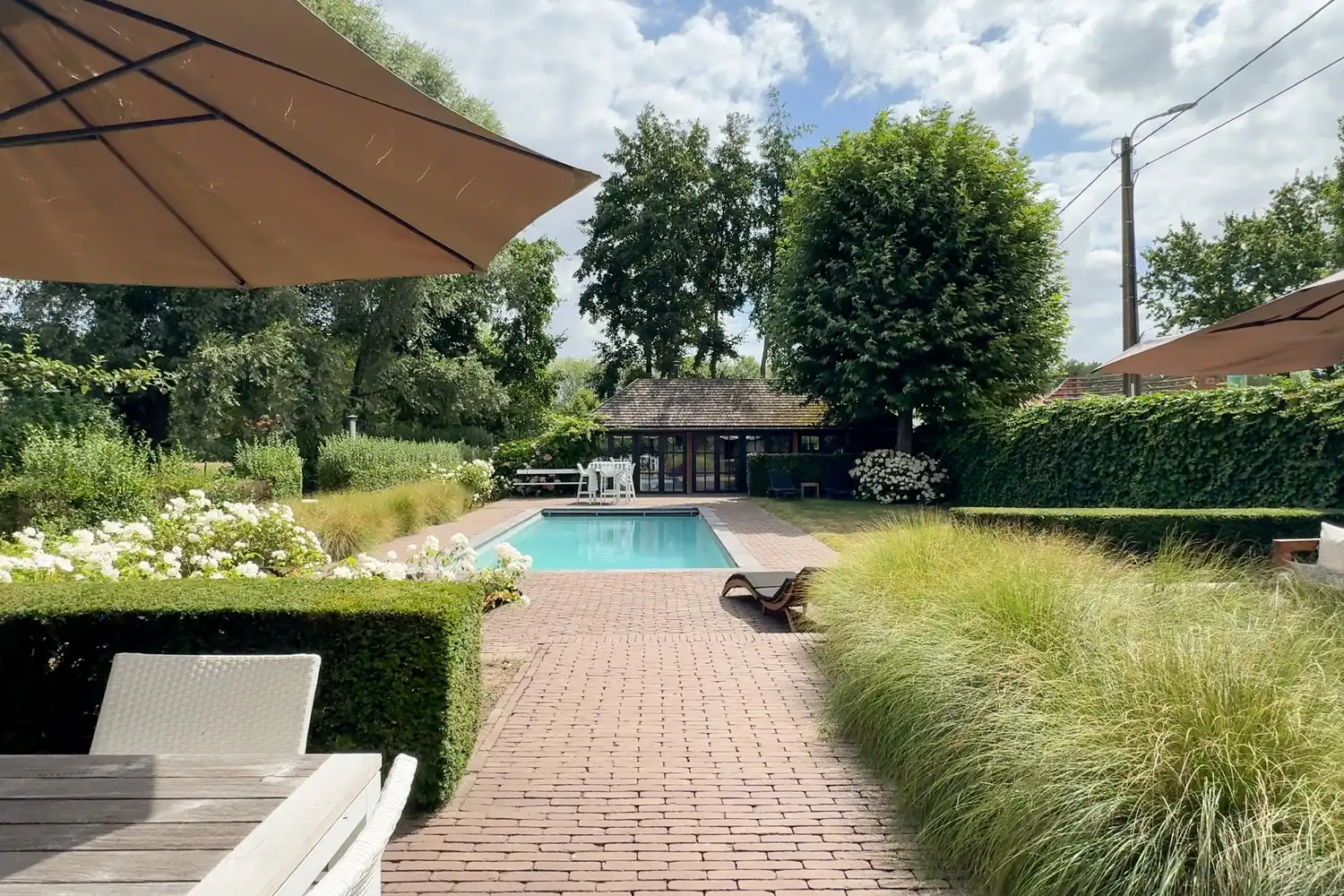Karaktervolle woning met verwarmd zwembad en poolhouse — Verrebroek foto {{pictureIndex}}