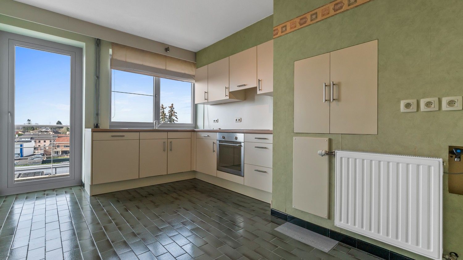 Ruim en lichtrijk appartement met 3 slaapkamers, kelder en autostaanplaats foto 6