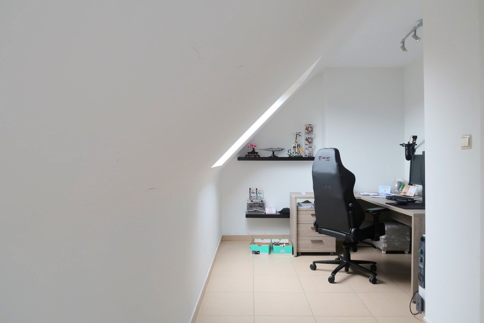 Opbrengsteigendom met 3 appartementen en 3 garageboxen. Ideale investering! foto 20