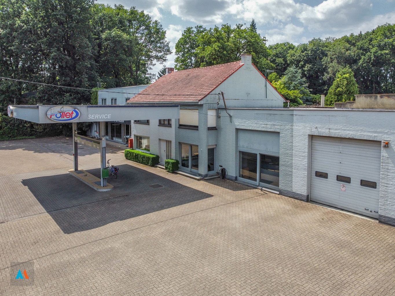 Garagebedrijf met woonst foto 25