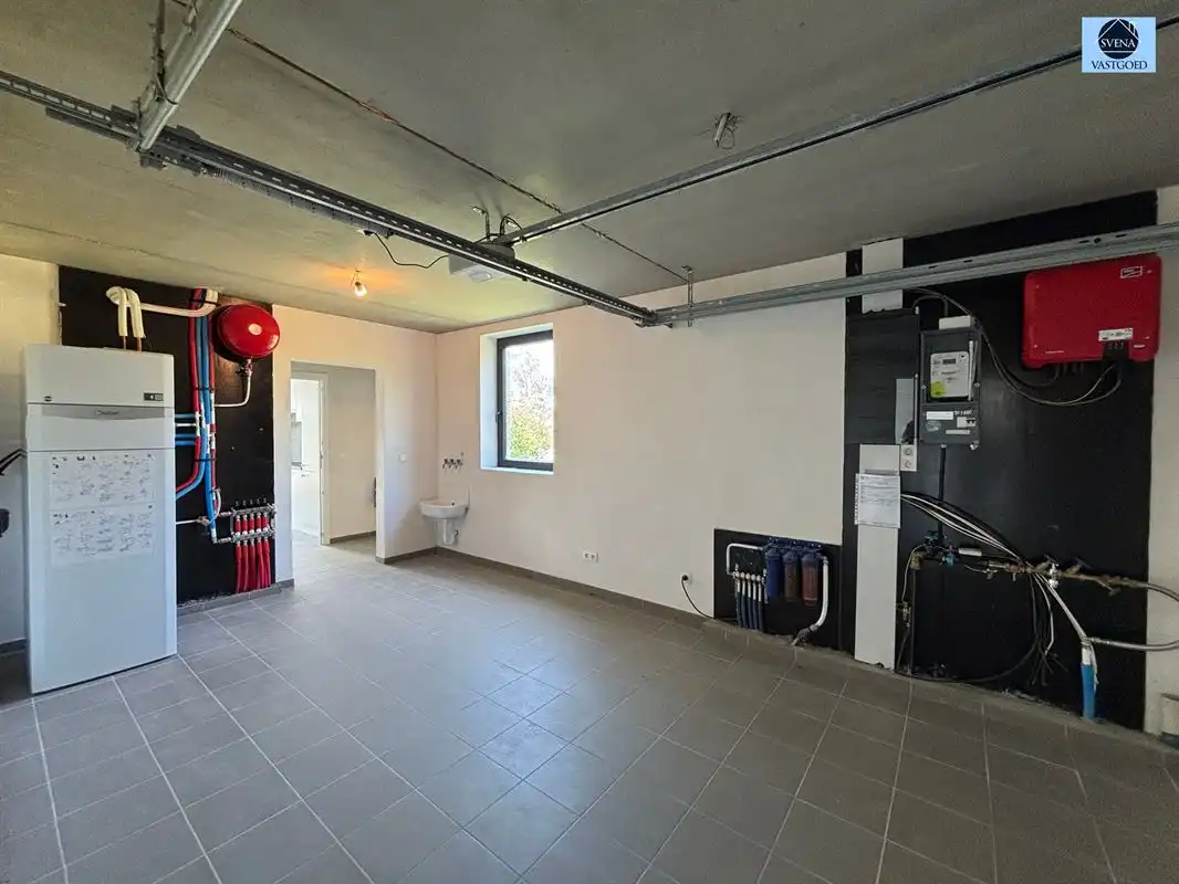 INSTAPKLARE BEN-WONING MET KELDER, GARAGE EN ZONNIGE TUIN IN ASPELARE foto 16