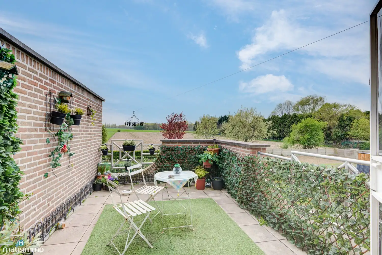 GOED ONDERHOUDEN APPARTEMENT MET GARAGE, KELDER EN RUIM ZUIDWESTGEORIËNTEERD TERRAS IN BILZEN foto 11