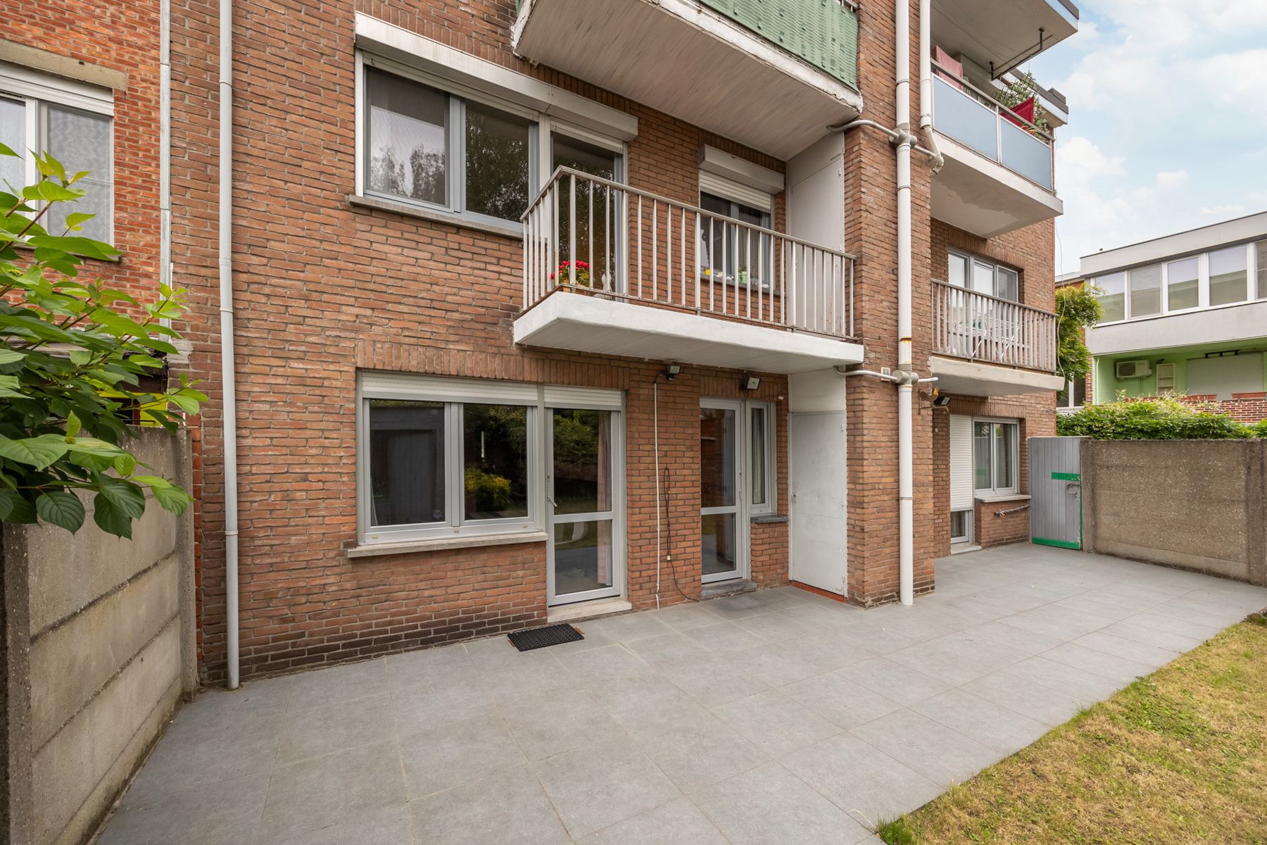 Uniek gelijkvloersappartement met 2 à 3 slpks en grote tuin foto 17