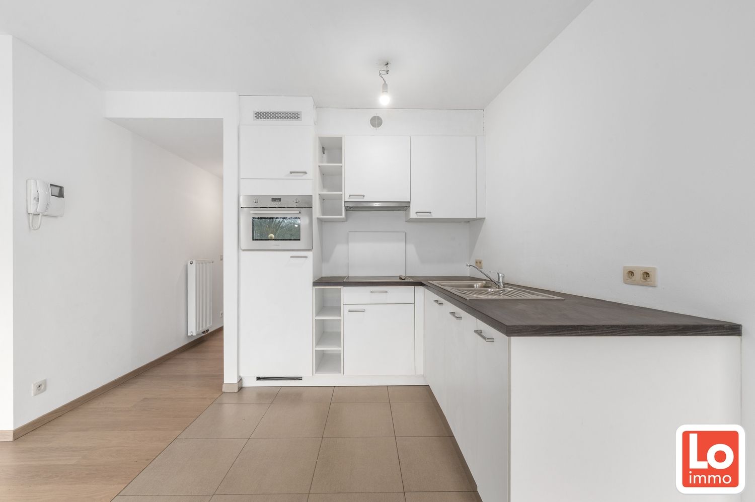 Mooi appartement met 2 slaapkamers, zuid-gericht terras en autostaanplaats in Centrum Lochristi foto 4