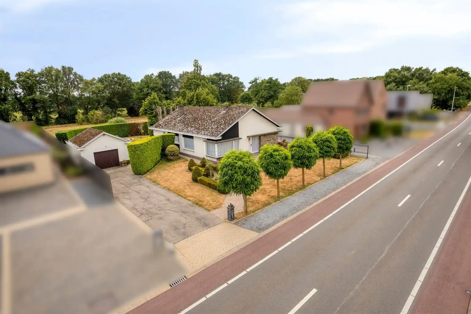 Charmante, gelijkvloerse woning met 3 slaapkamers, vrijstaande garage en uitzonderlijk ruime, zuidgerichte tuin op een prachtig perceel van 21a38ca in Oudsbergen. foto 29