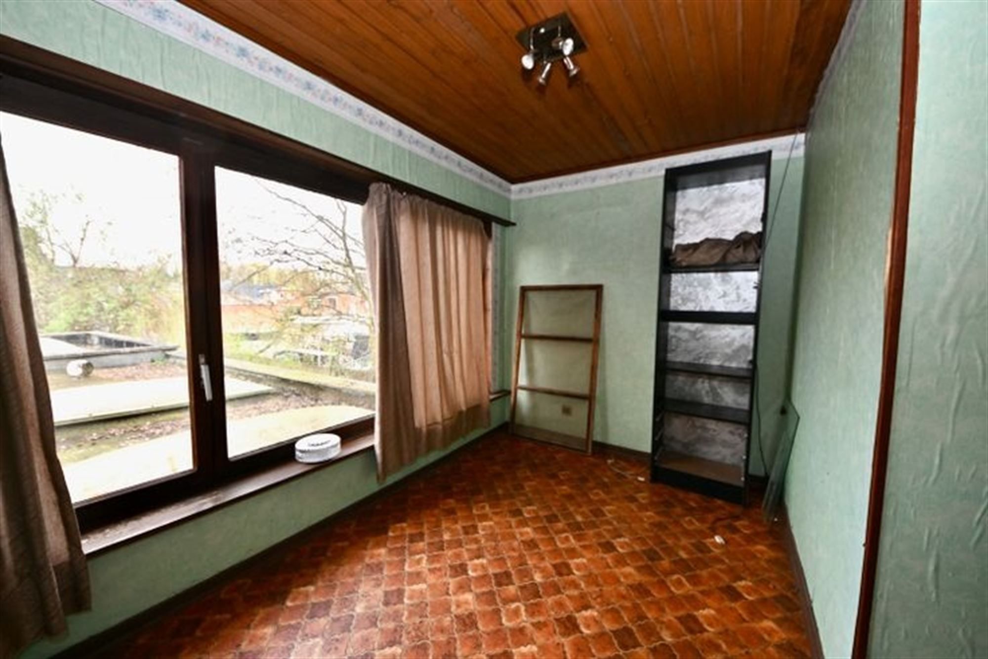 Te renoveren woning met 2 slaapkamers en tuin. foto 14