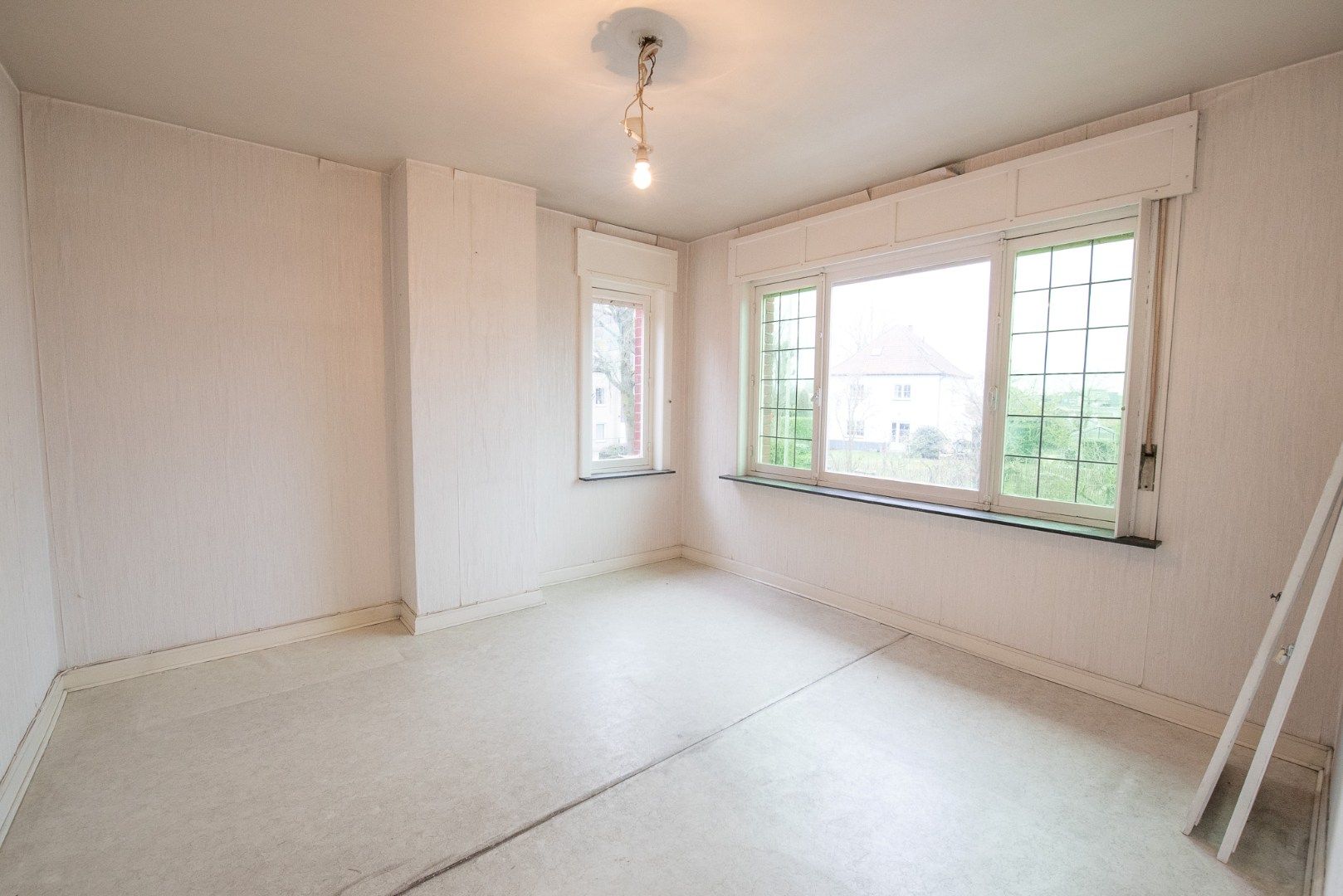 Te koop in Waregem – Halfopen bebouwing met renovatiepotentieel! foto 11