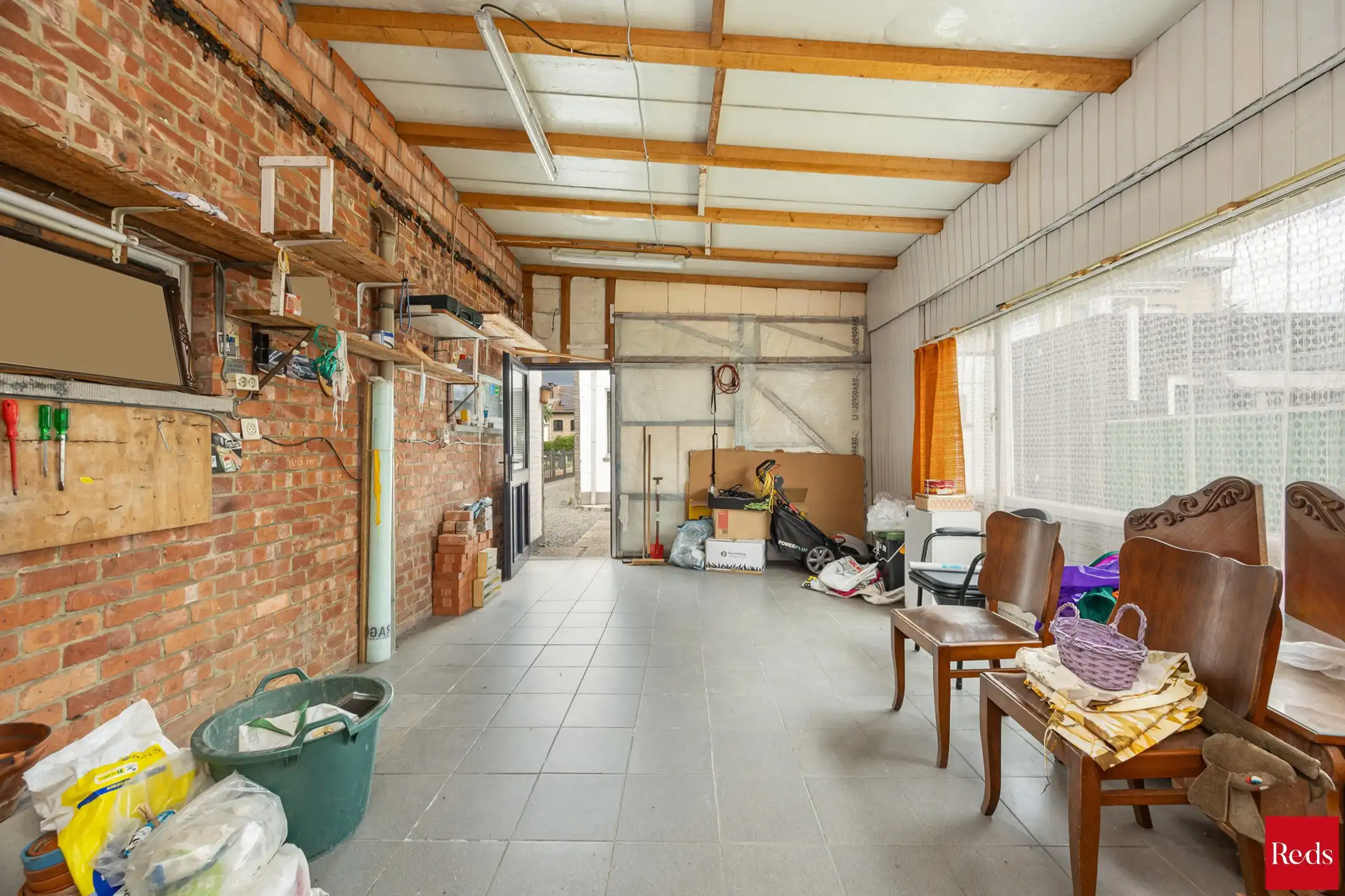  Halfopen bebouwing met tuin en garage foto 17