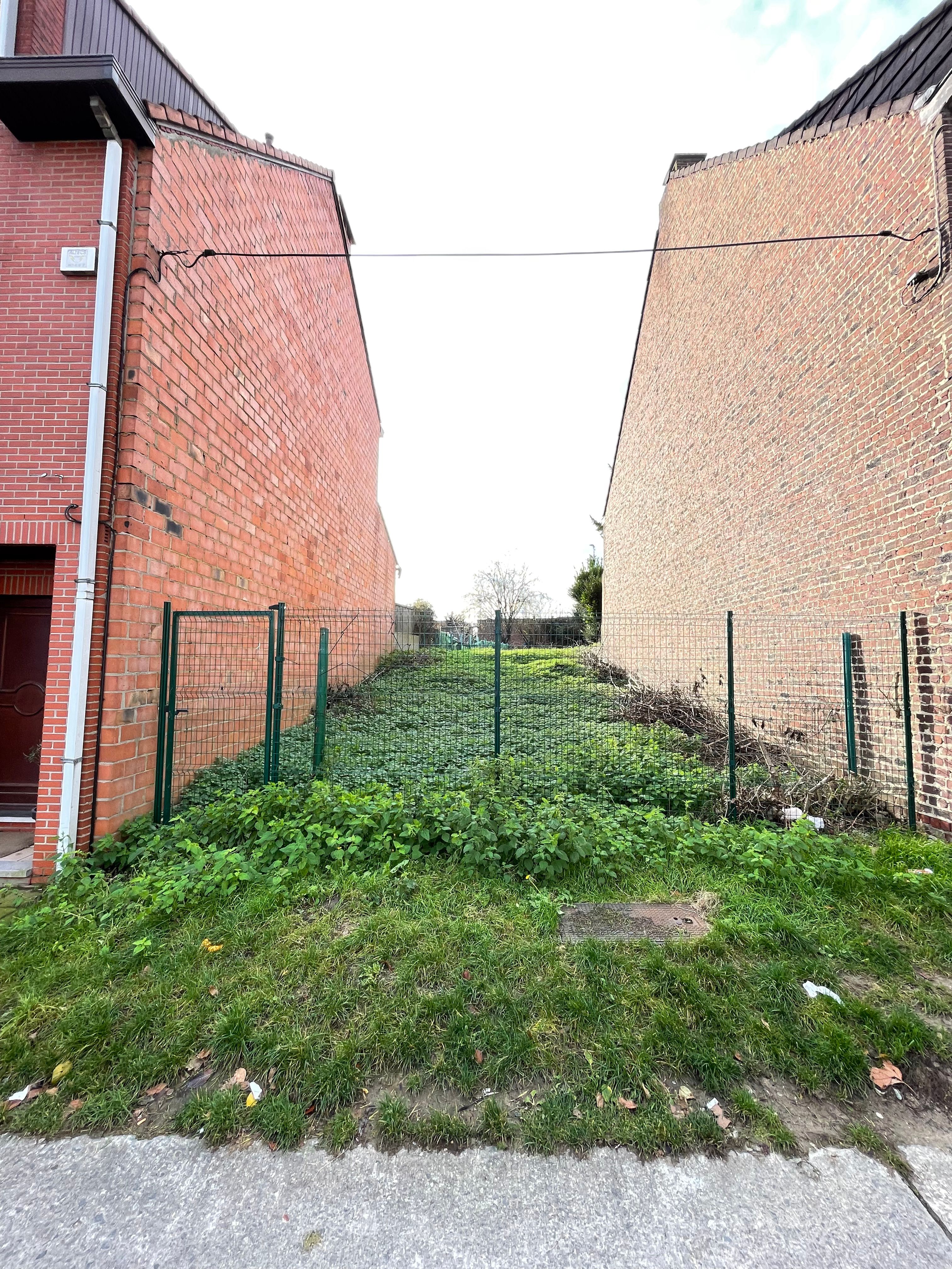 Bouwgrond 2 gevel woning met tuin foto 9