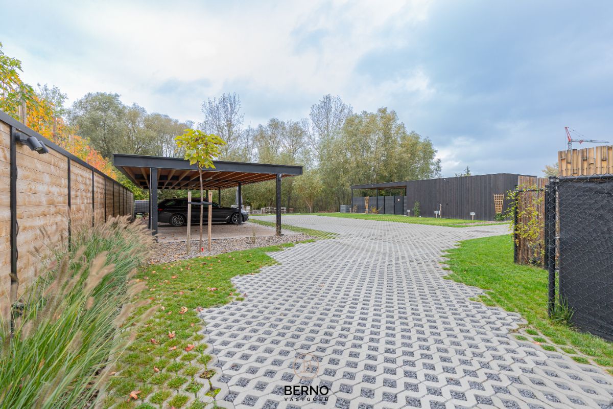 Recent gelijkvloers appartement met zonnig terras en tuintje in Opstal foto 19