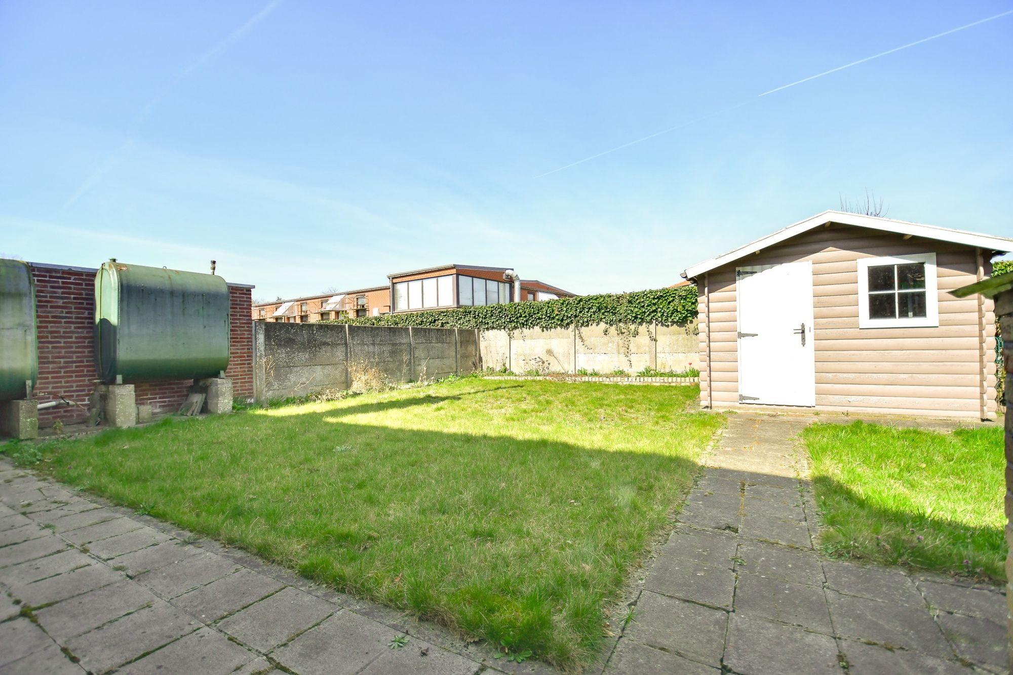 LICHTRIJKE WONING met  3 SLPK - GARAGE EN ZONNIGE TUIN foto 3