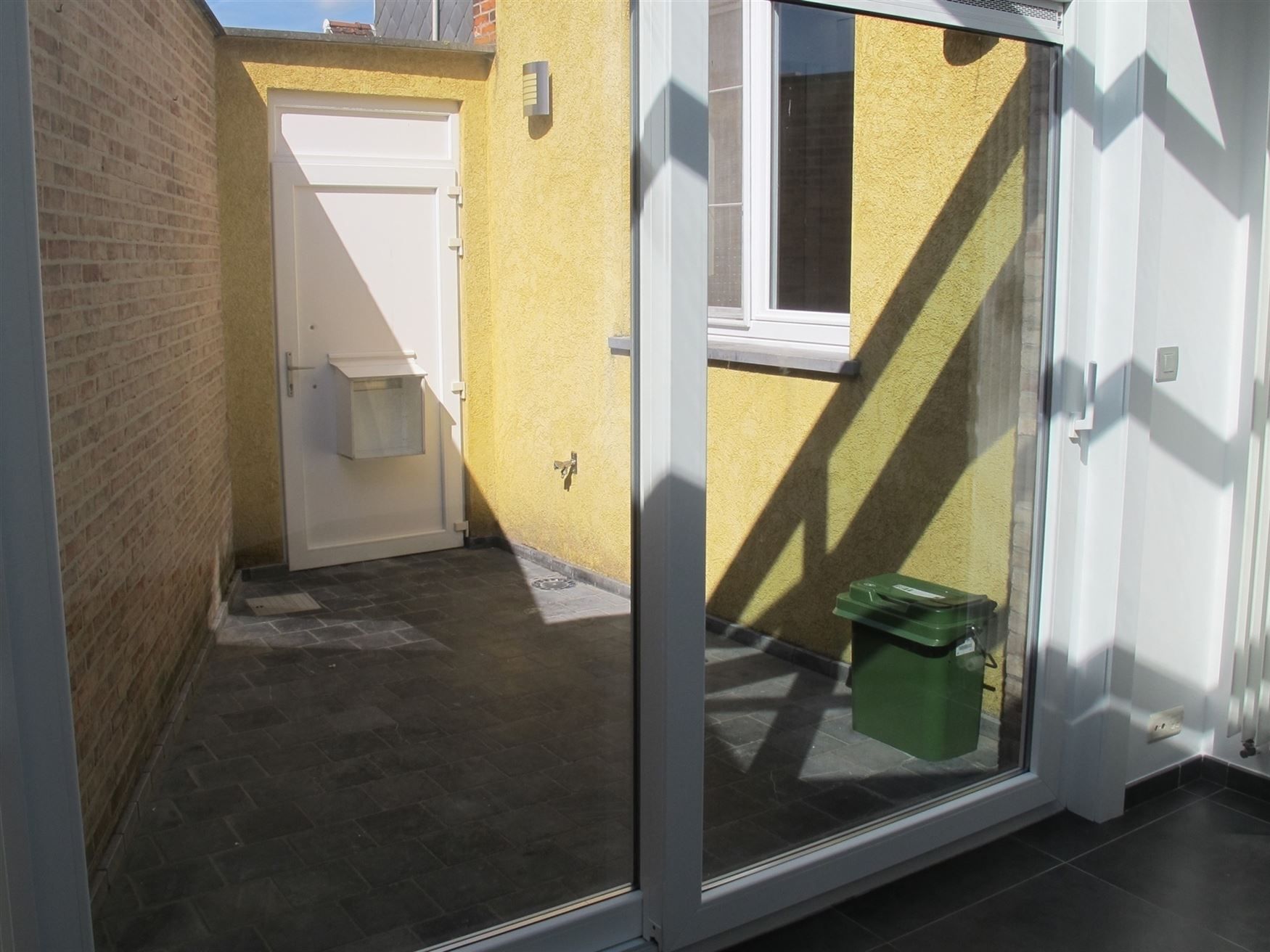 Hippe stadswoning met zonnige koer foto 6