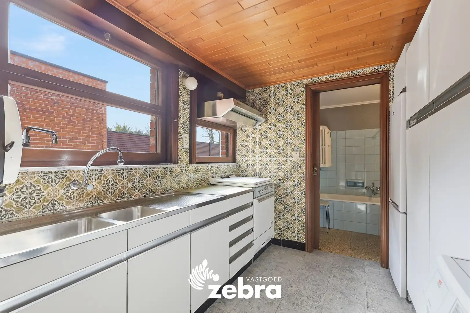 Woning met veel potentieel, 3 slaapkamers en ruime zolder in hartje Tielt! foto 5