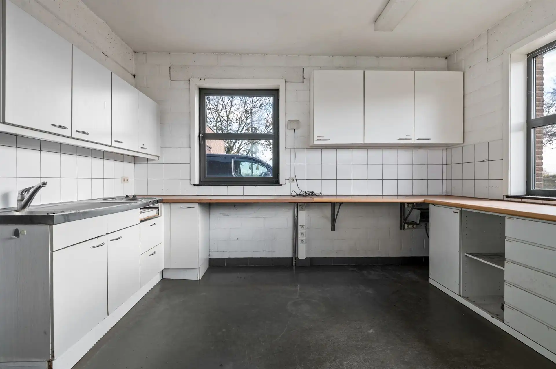Handelspand met ruim appartement op een toplocatie in Sint-Gillis-Waas foto 7