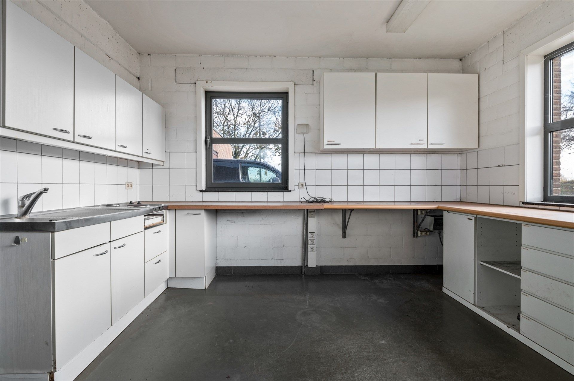 Handelspand met ruim appartement op een toplocatie in Sint-Gillis-Waas foto 7