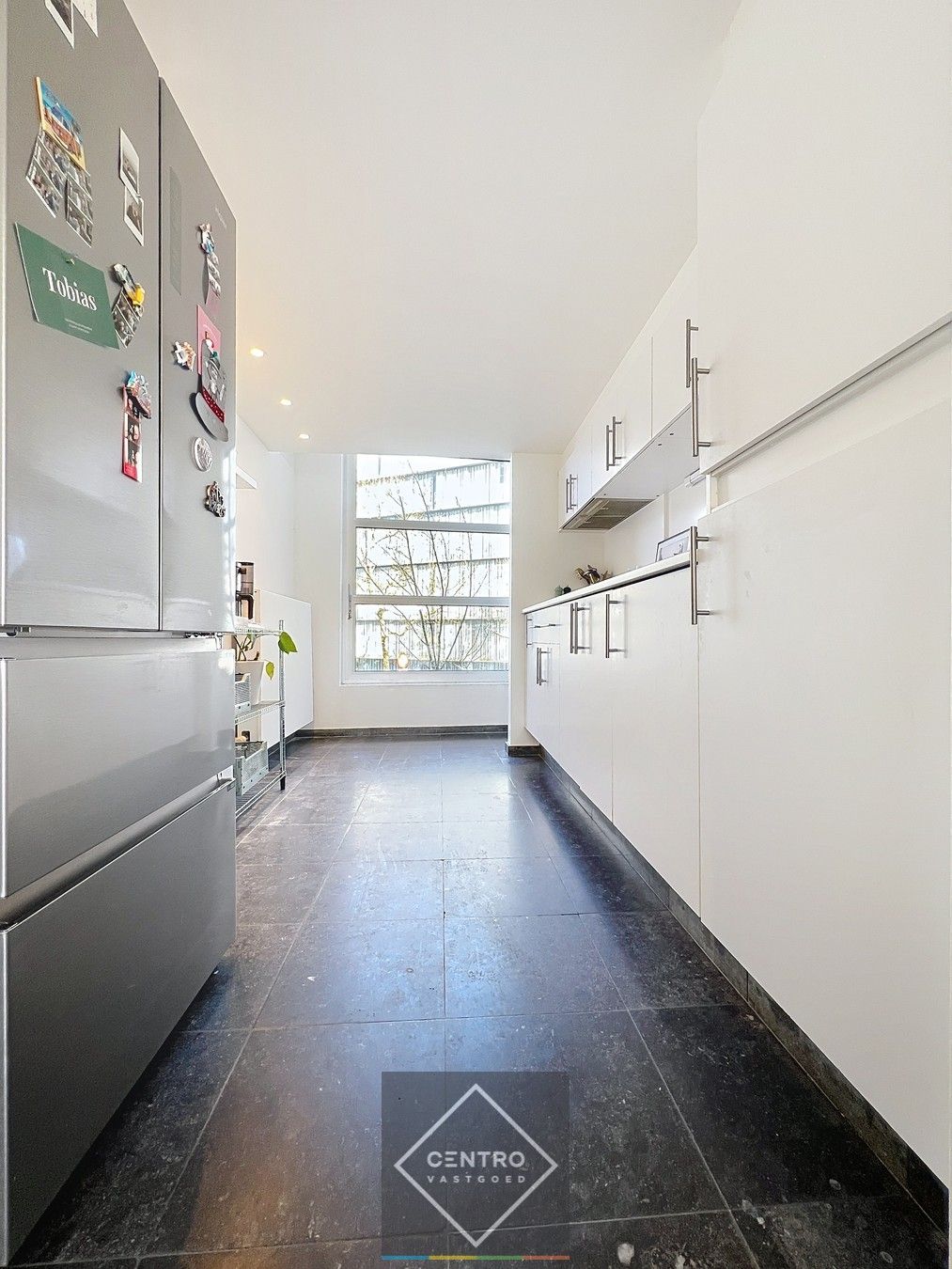 Gelijkvloerse kantoor/praktijkruimte én triplex appartement (met aparte toegangen) op het Kerkplein van Rumbeke! foto 6