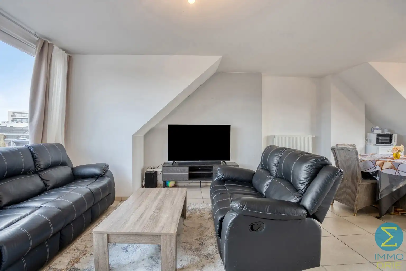 Dakappartement met 1 slpk, groot terras en autostaanplaats foto 4