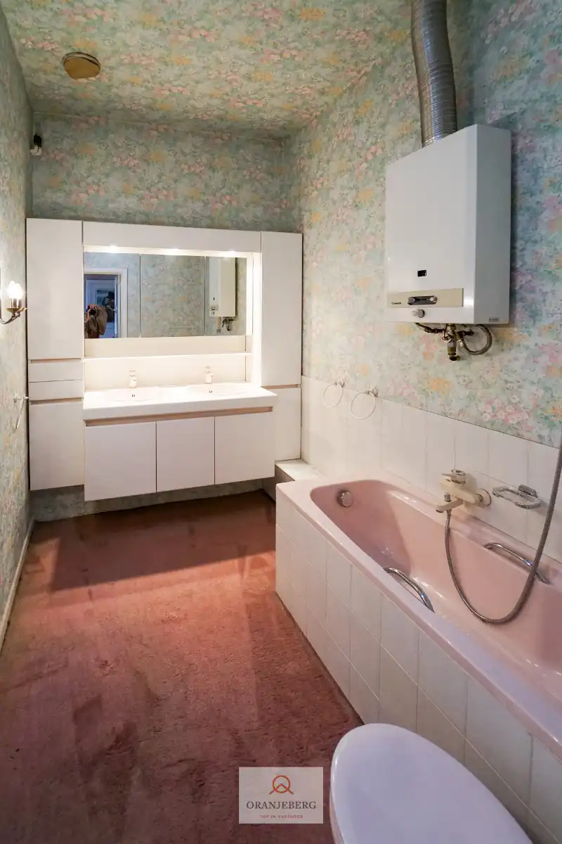 Charmante op te frissen woning met stadstuin! foto 14