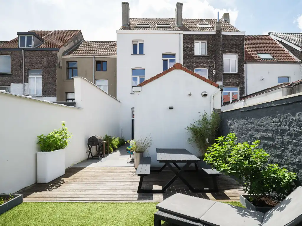 Karaktervolle woning met 4 slaapkamers en zonnige stadstuin op een boogscheut van het centrum van Gent. foto 2