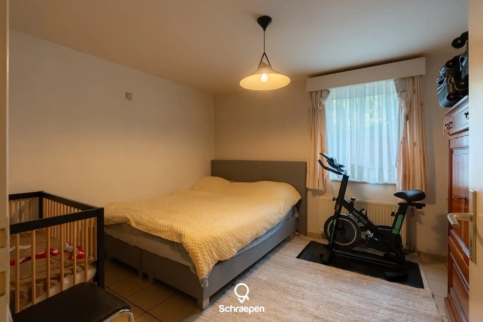 Lichtrijk gelijkvloers appartement met garagebox en privétuintje nabij Zonhoven-centrum! foto 11