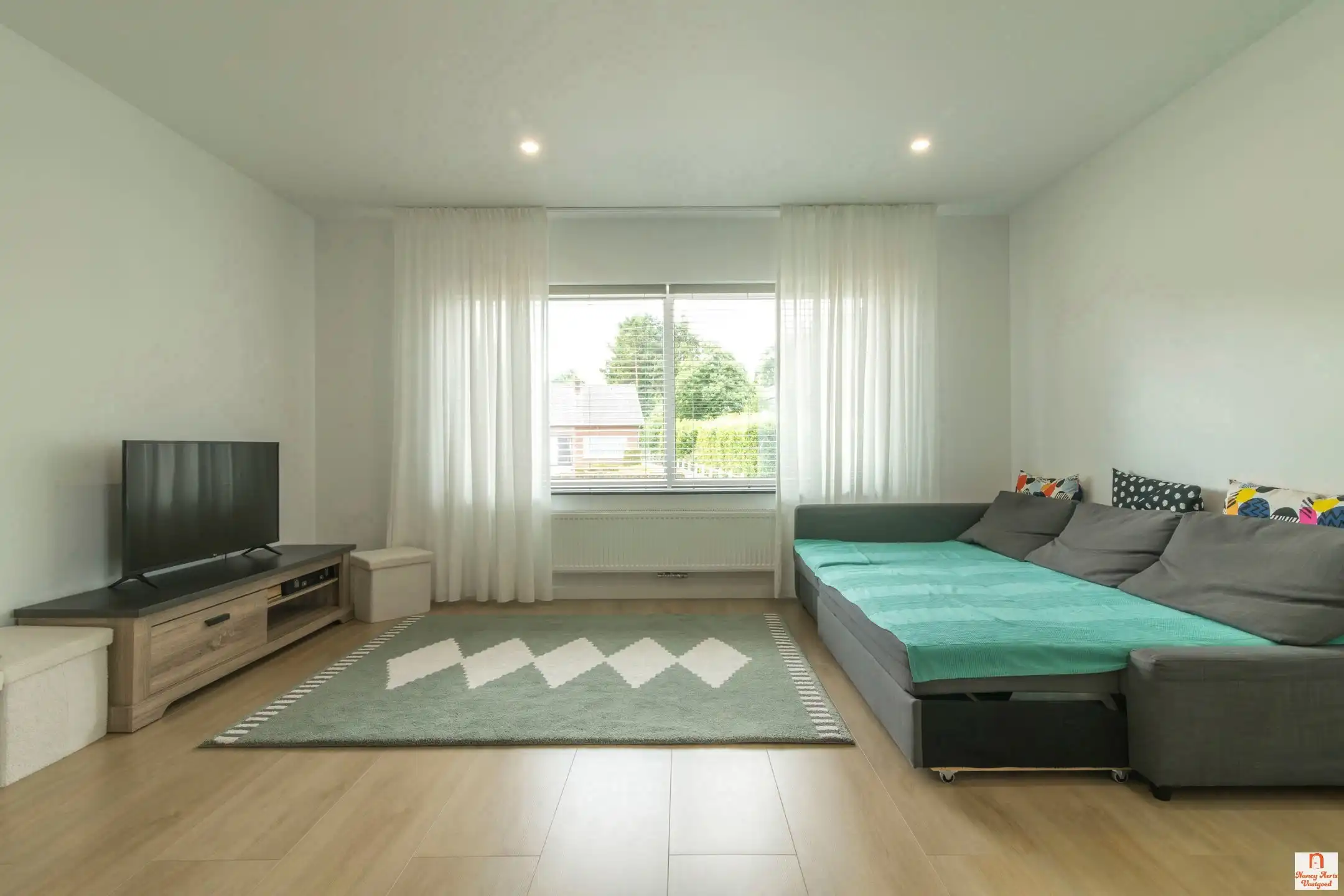 Ruime, vernieuwde woning met terras en tuin in Koersel foto 6