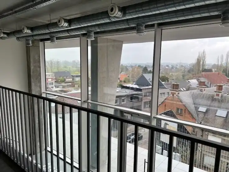 200 m² commerciële ruimte met mezzanine in hartje Merchtem – toplocatie met visibiliteit foto 9