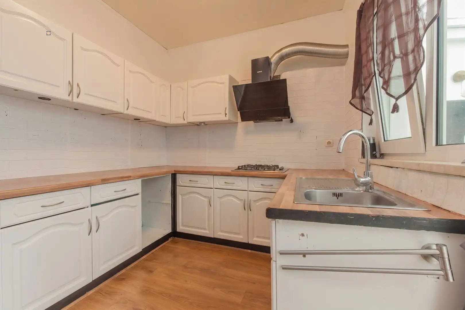 Opbrengsteigendom met handelsruimte en verhuurd duplex appartement in het centrum van Willebroek foto 17
