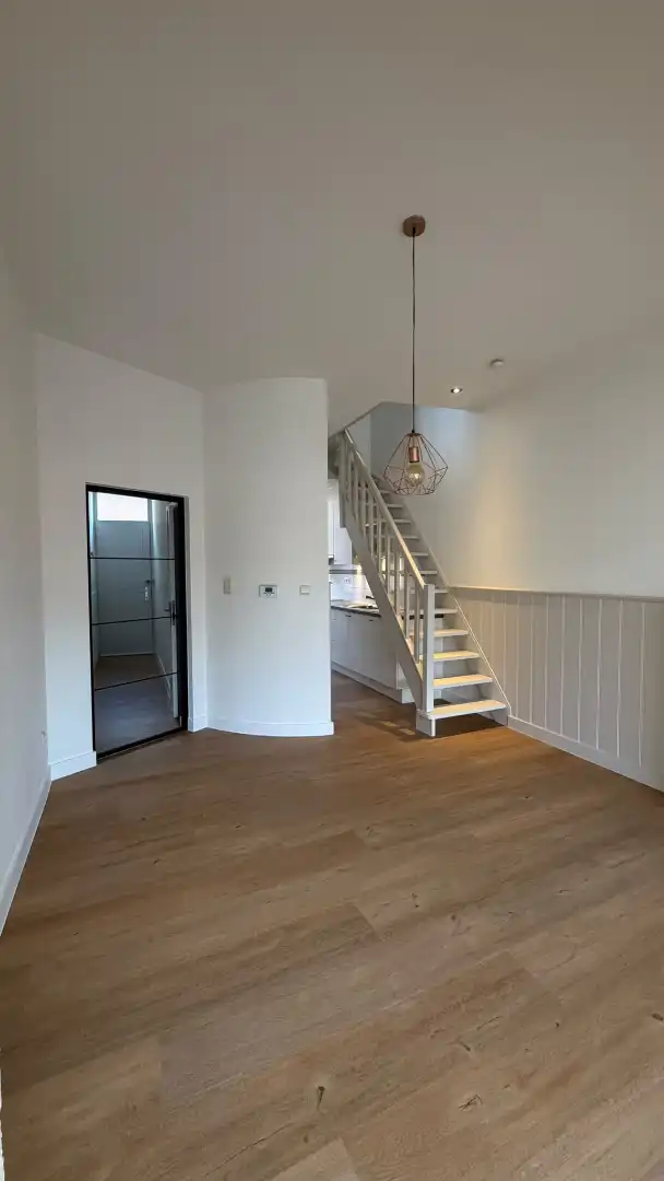 Instapklare trapgevelwoning met zonnig terrastuintje en grote berging, centrum, rustige straat omgeving ’t Zand foto 7