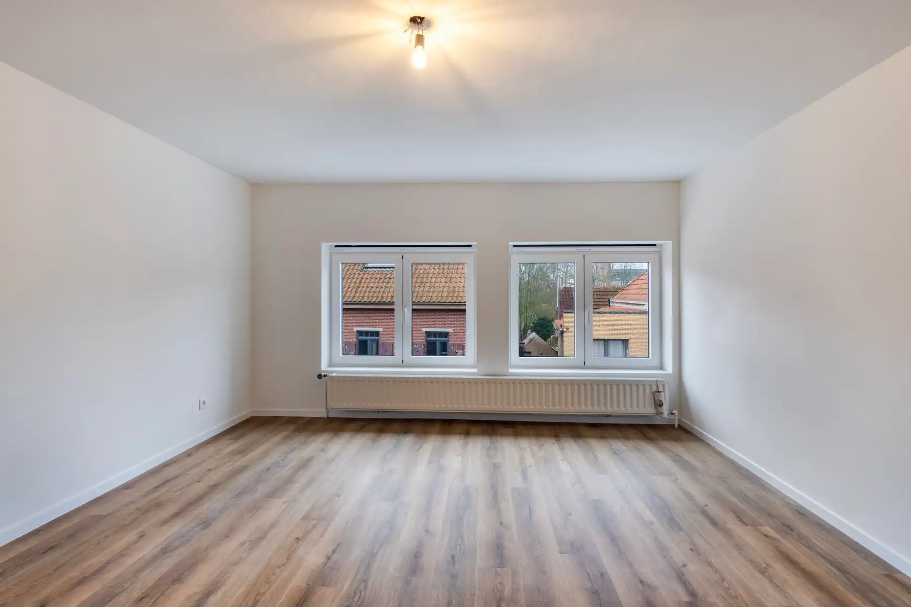 Instapklare woning met 3 slpk, garage en tuin! foto 13