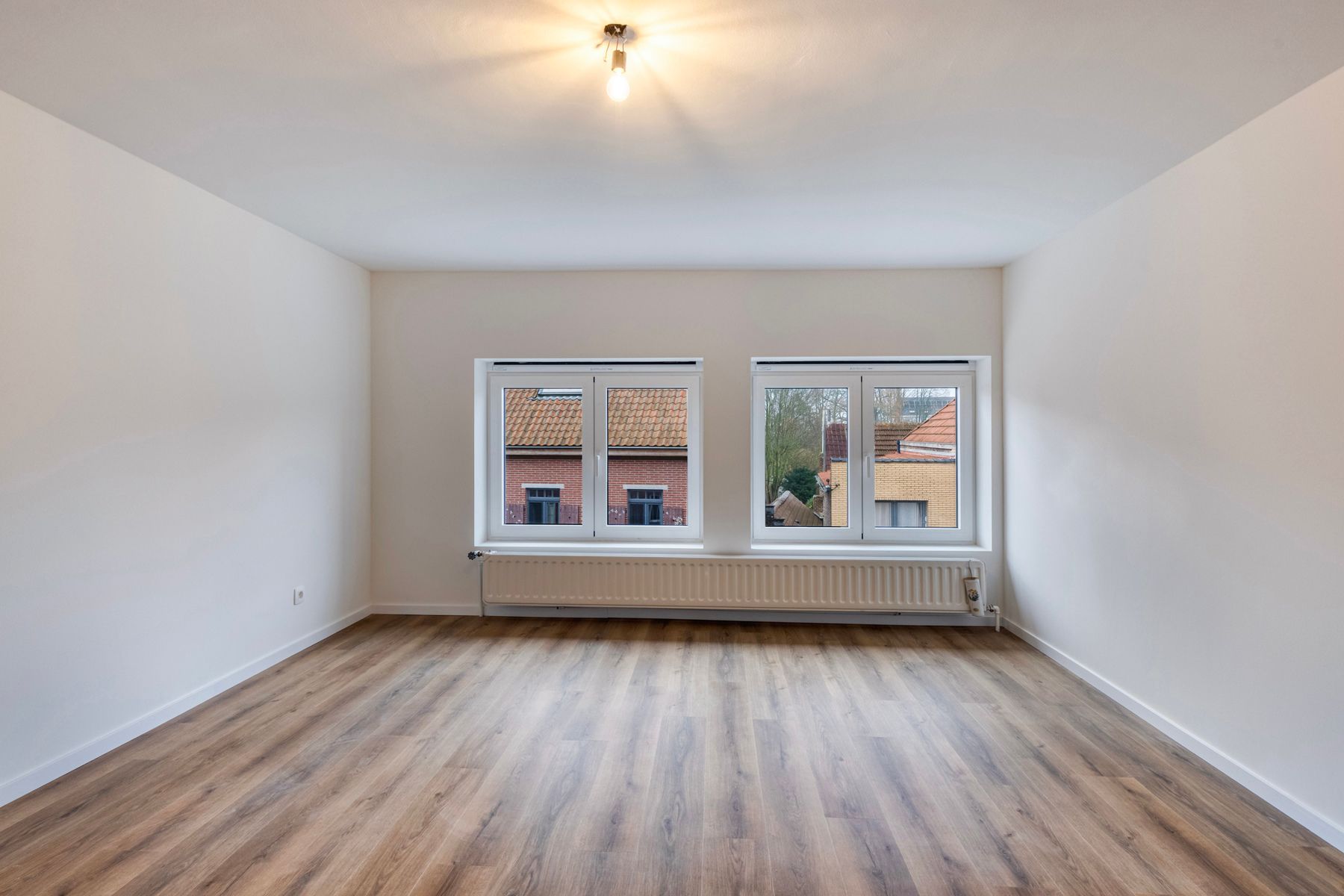 Instapklare woning met 3 slpk, garage en tuin! foto 13