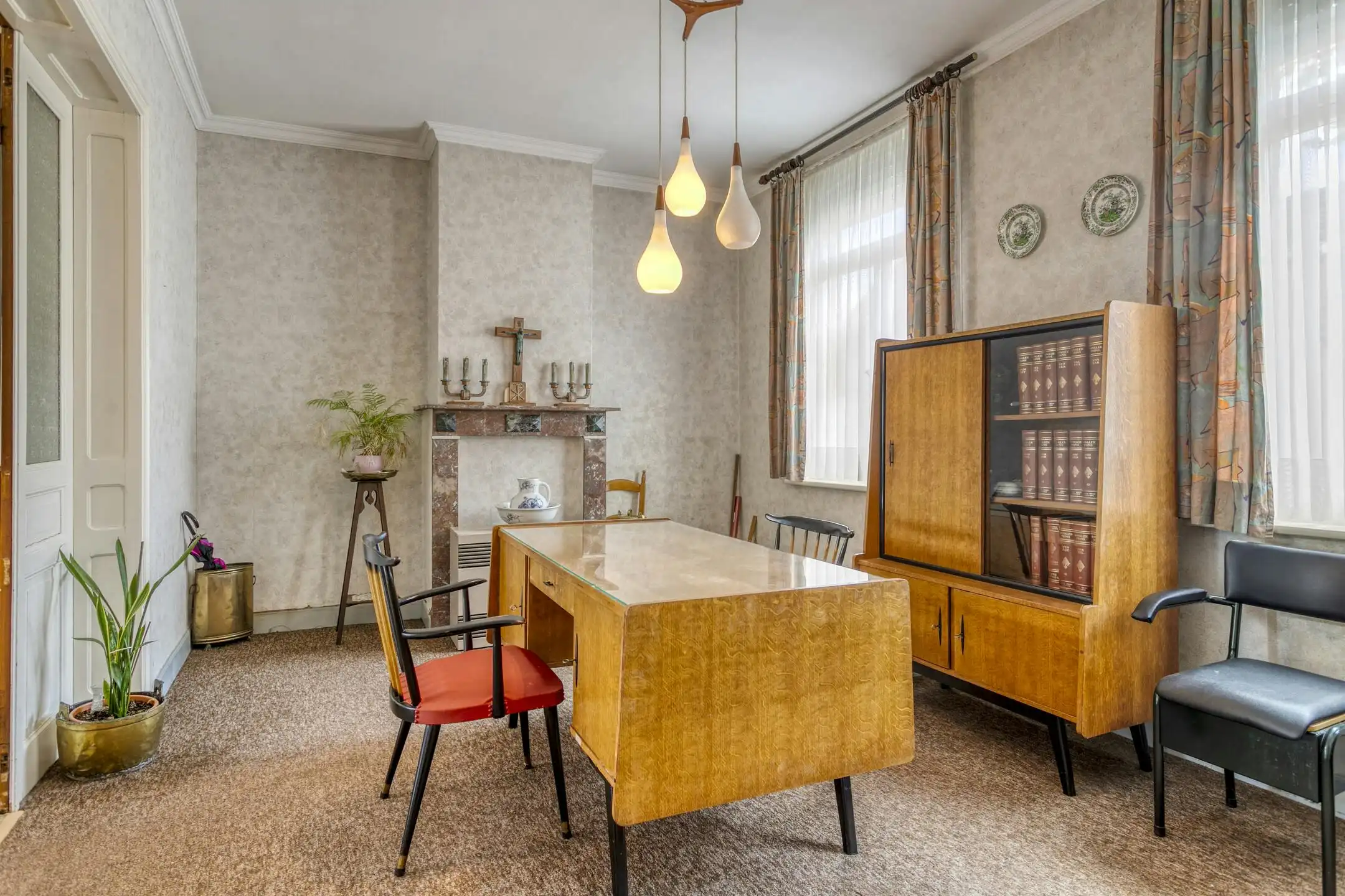 Hoofdfoto van de publicatie: Karaktervol huis met zonnige tuin, 3 slaapkamers én garage met uitweg