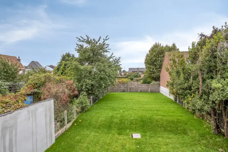 Ruime en instapklare woning met 4 slaapkamers en tuin foto 11