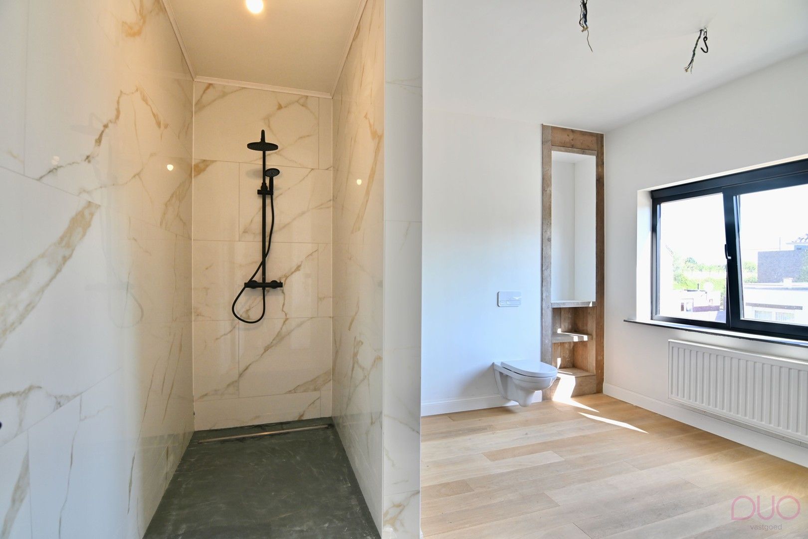Instapklare gerenoveerde woning op wandelafstand van de Grote Markt en het treinstation foto 13