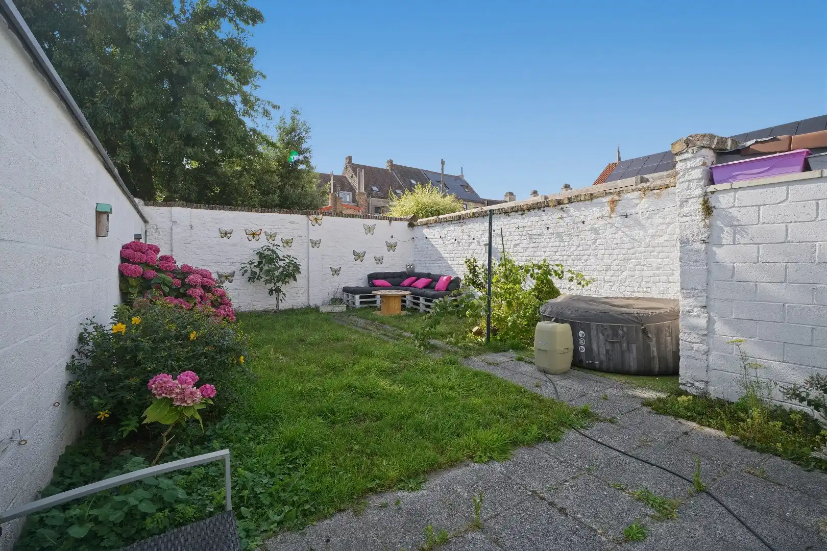 Ruime rijwoning met zongerichte tuin in Nieuwpoort-Stad.  foto 16