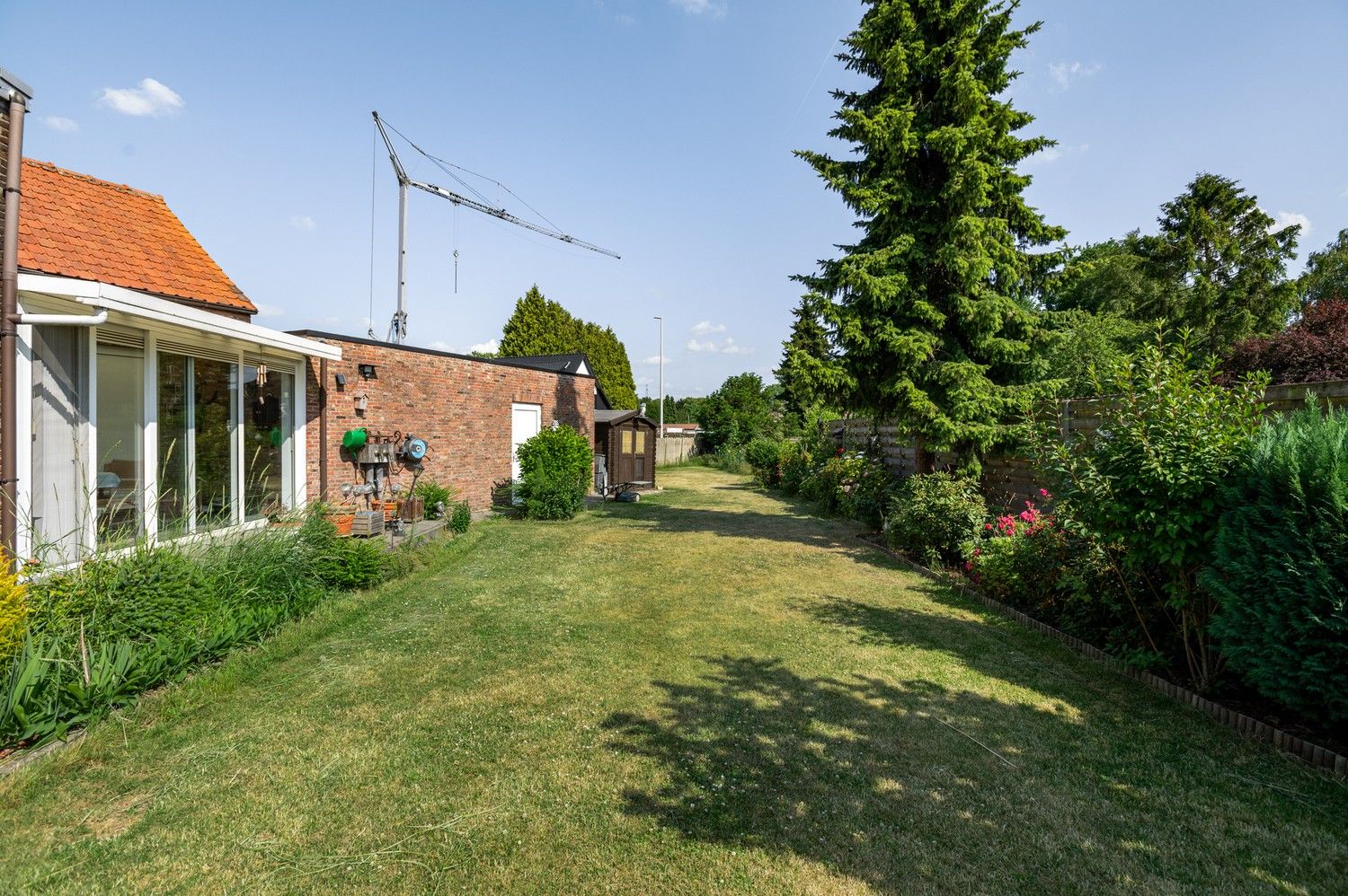 Verassend ruime woning met 3 slaapkamers en een groene tuin nabij centrum ranst. foto 3