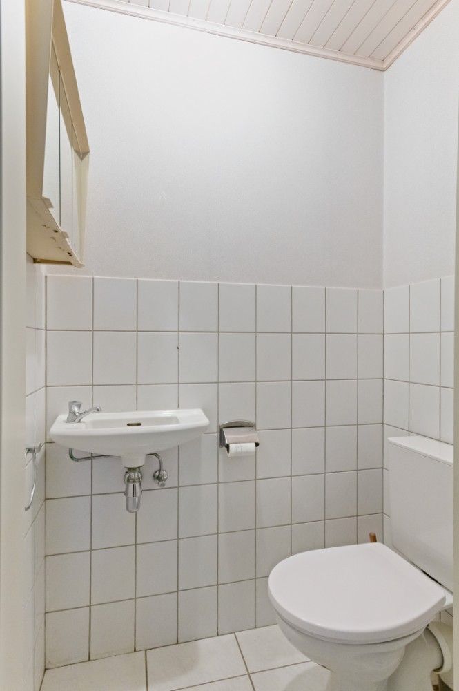 Keurig, ruim gelijkvloersapp. met 2 slpk., inpandige garage en tuin foto 14