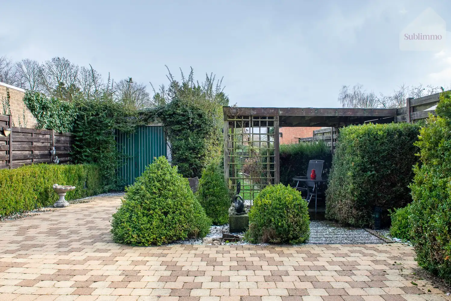 Opbrengsteigendom met 2 appartementen, tuin en garages te koop in Mol centrum foto 35
