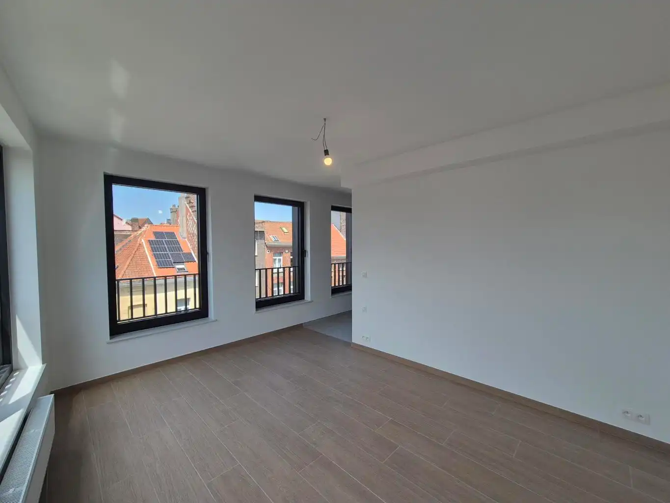 Nieuwbouw duplex met 2 slpks, bureel, terras en kelder foto 6