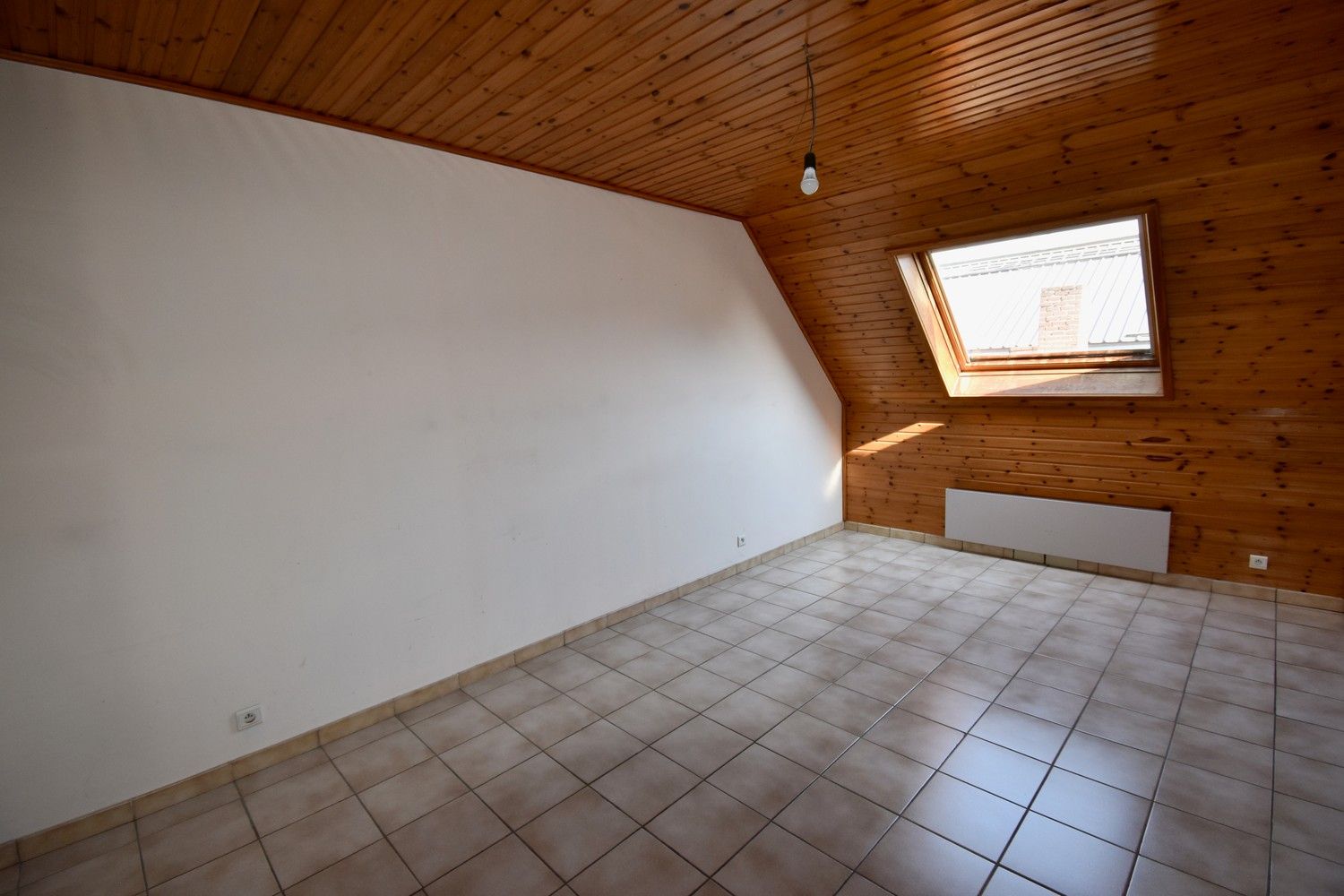 Polyvalent gebouw bestaande uit winkelruimte, appartement en loods foto 12