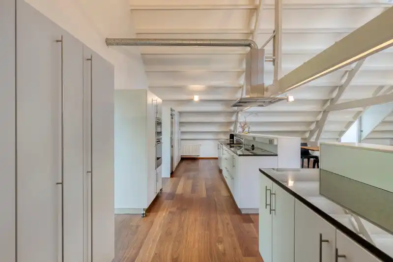Exclusieve topfloor loft met indrukwekkend volume foto 11