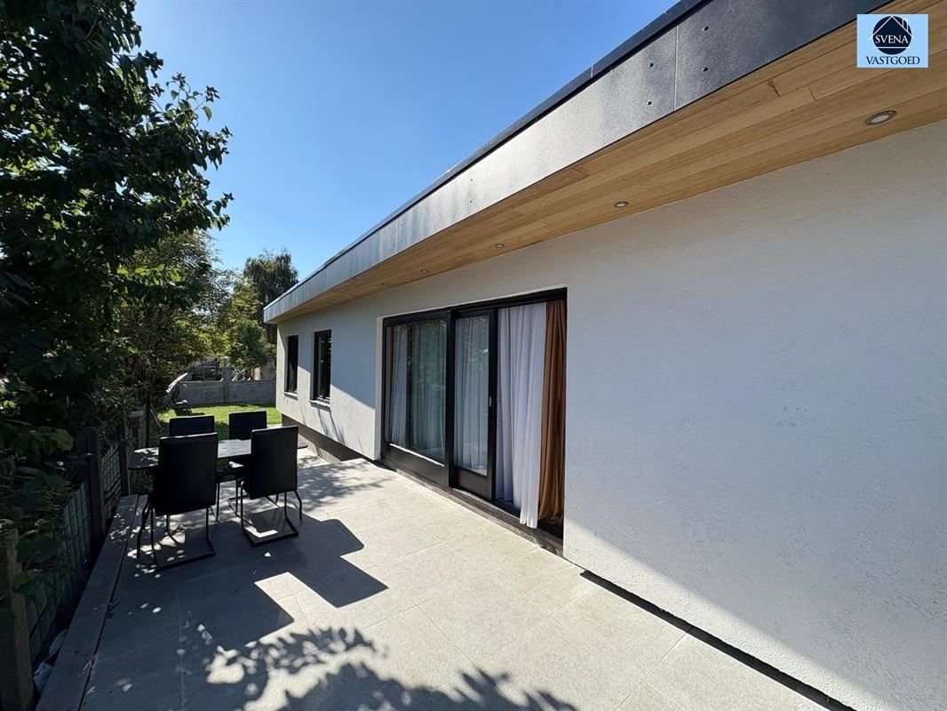 WONING MET HANDELSRUIMTE EN 3 SLAAPKAMERS foto 2