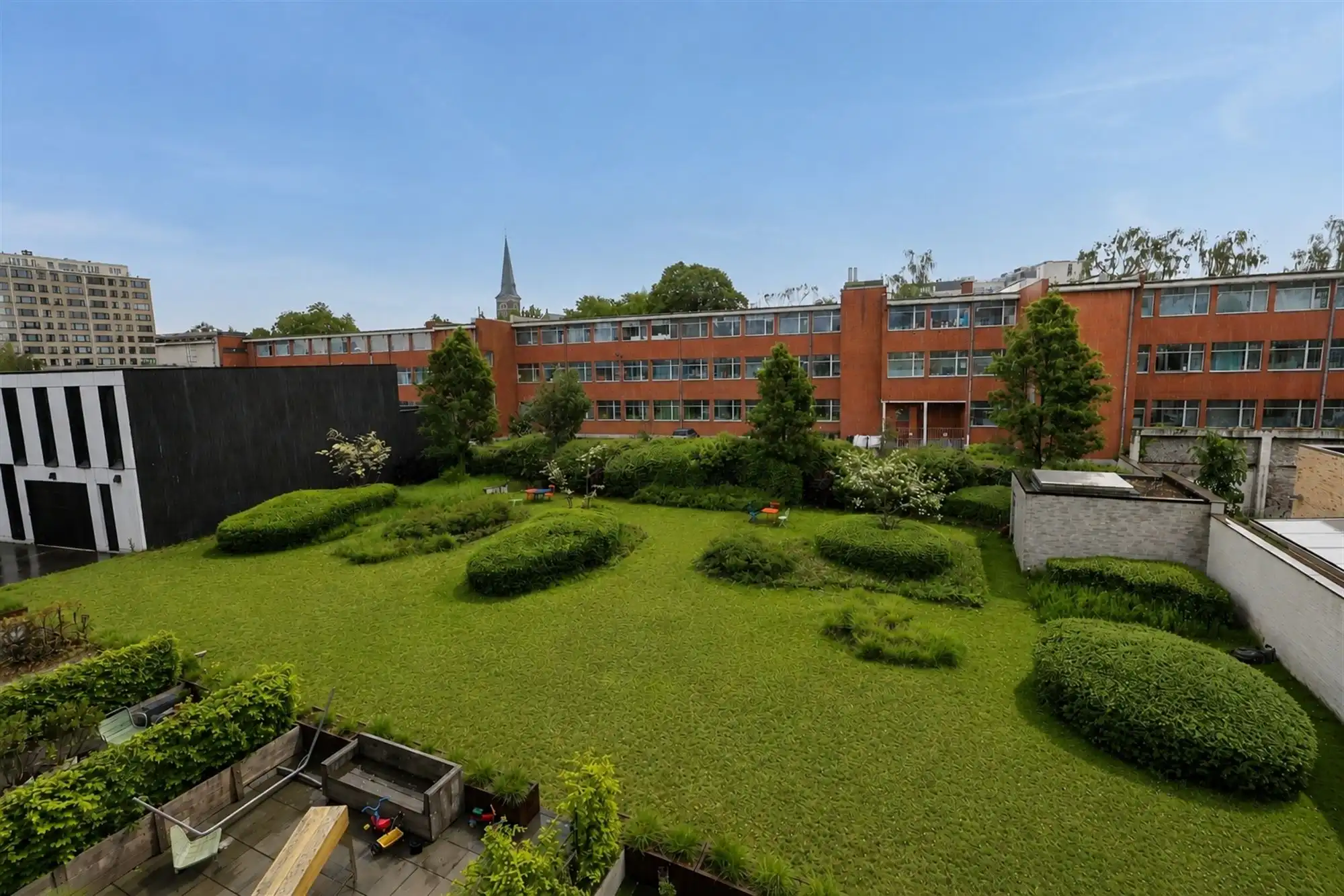 Energiezuinig appartement met terras en gemeenschappelijke tuin foto 8