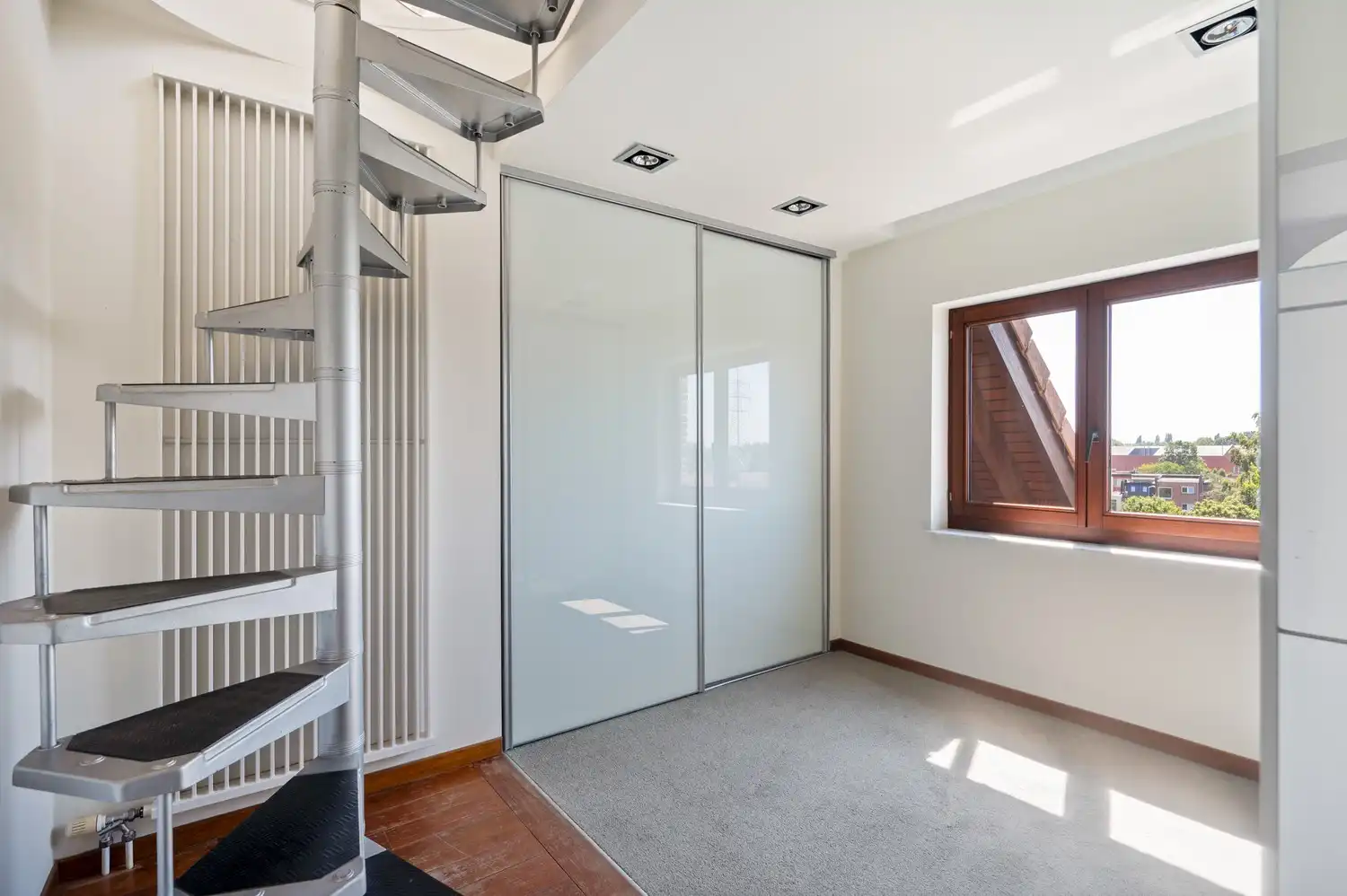 Triplex penthouse met 2 slaapkamers, ruim zonneterras en garagebox te Lier foto 9