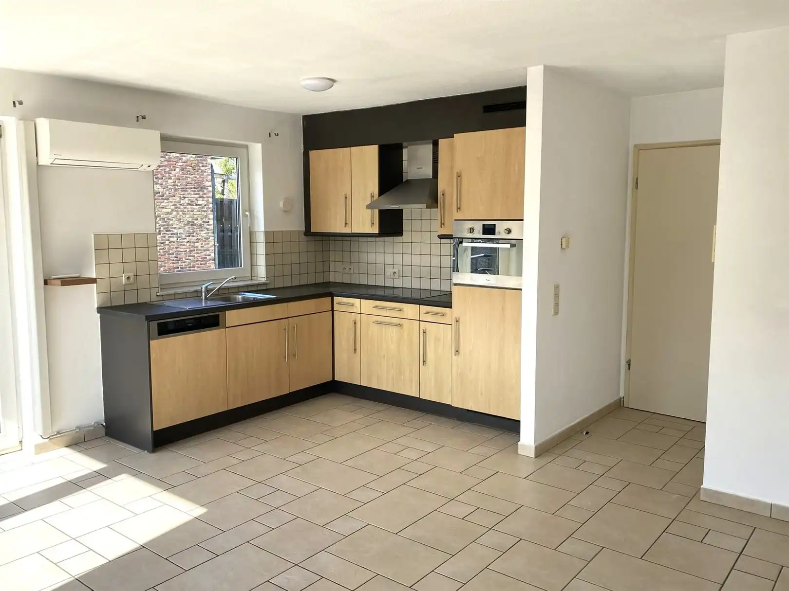 Instapklaar appartement in het centrum van Denderbelle foto 3