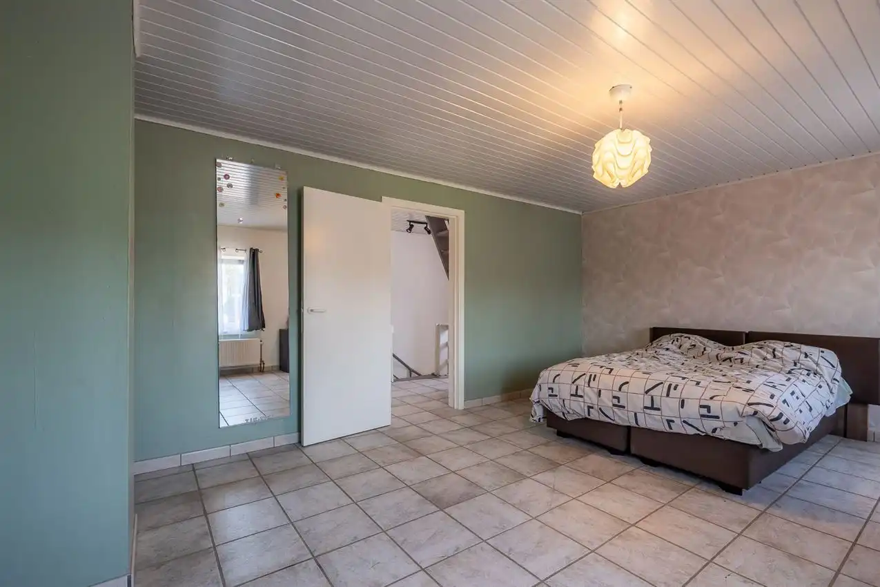 Verzorgde woning met 2 slpk., tuin en garage foto 15