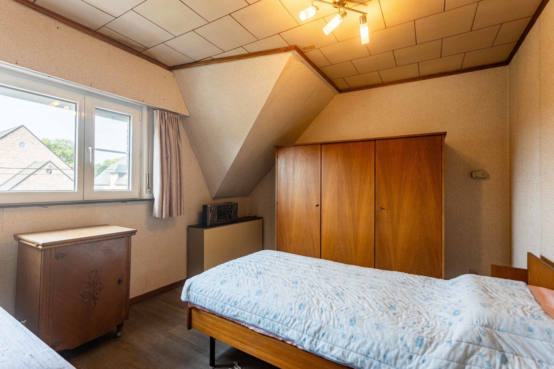 Charmante gezinswoning met 5 slaapkamers en riante tuin. foto 19