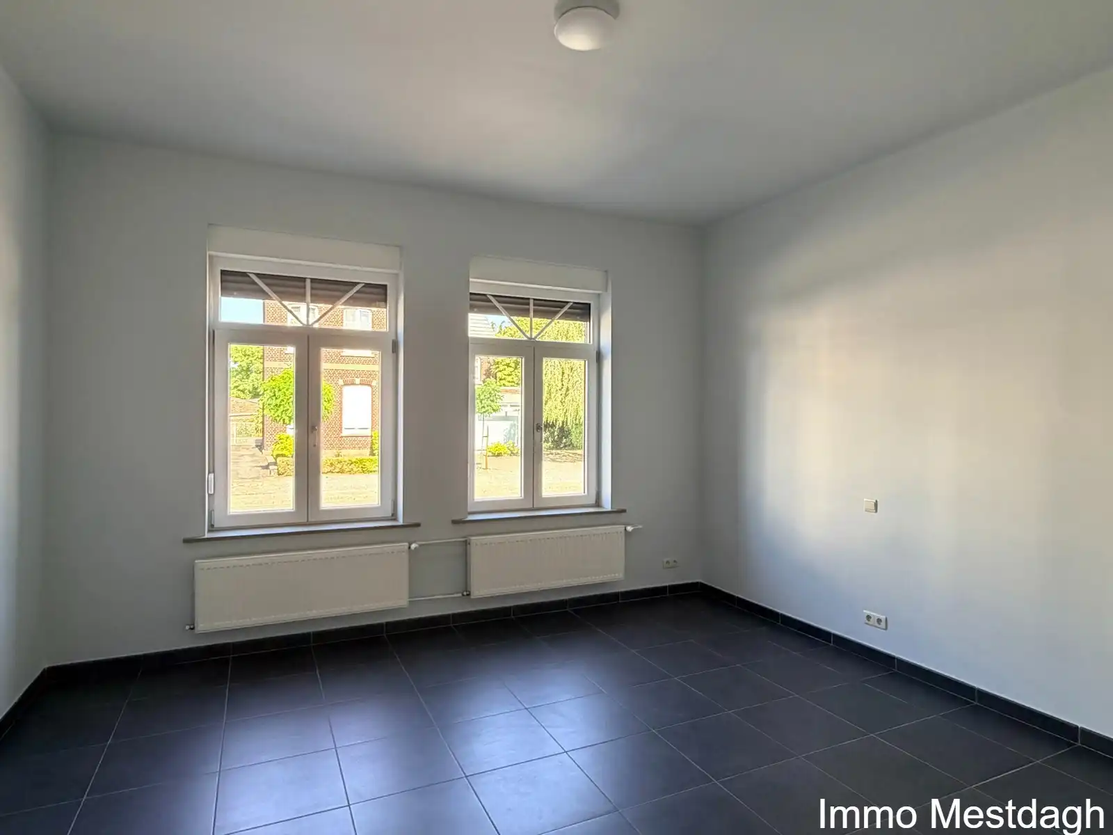 Prachtig gerenoveerd gelijkvloers appartement met terras en tuin in centrum Rummen foto 7