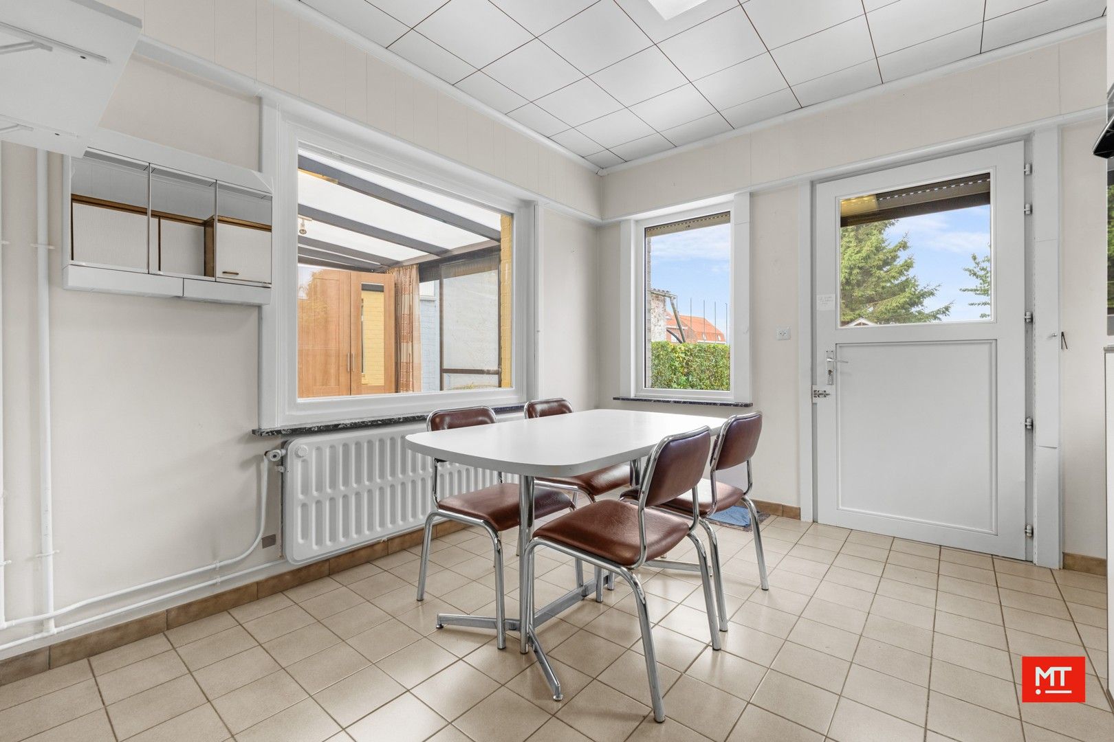 Te renoveren alleenstaande woning met 3 slaapkamers, Westgerichte tuin en garage in het centrum van Passendale foto 8