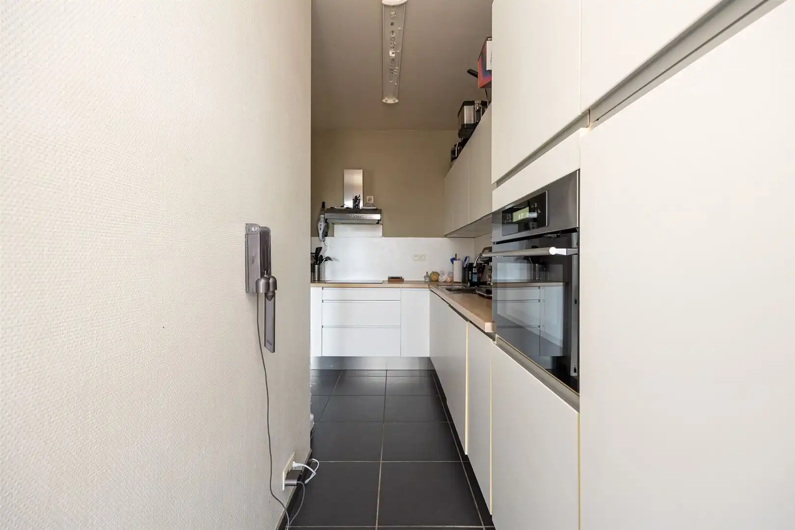 Opbrengsteigendom met 5 appartementen en garages foto 31